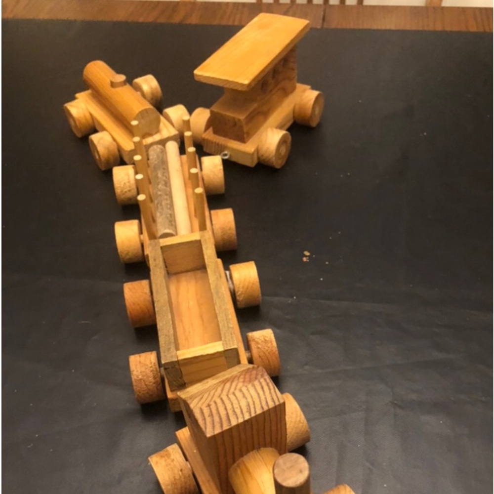 Vintage pull along stacking train. Downsizing and must sell? Asis, $on delivery.
